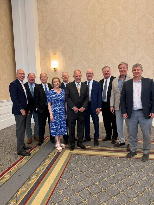 Bob Allen with a group of colleagues and fellow Vial Hamilton alums